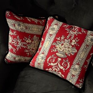 2 Pre-loved French Toile Pillows. Red and Cream with a black trim.